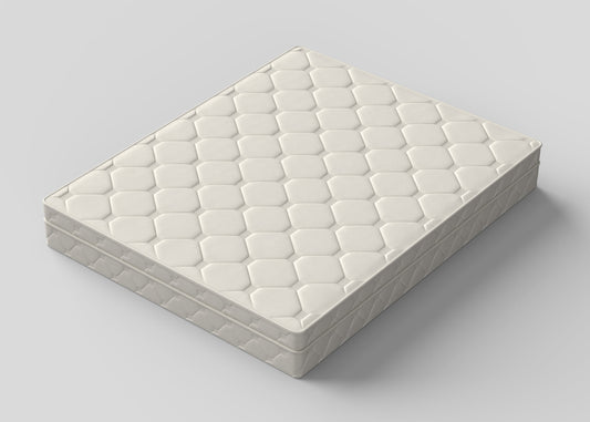 Organic mattress with quilted white cover shown on a neutral background, representing medium-firm support and natural sleep comfort.